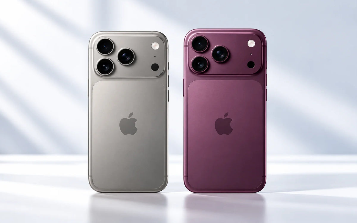 Editorial concept comparison of silver and burgundy iPhone designs, viewed from the back.
